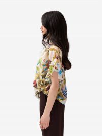 MOMONI' Blusa m/c con rouches fiori Panna